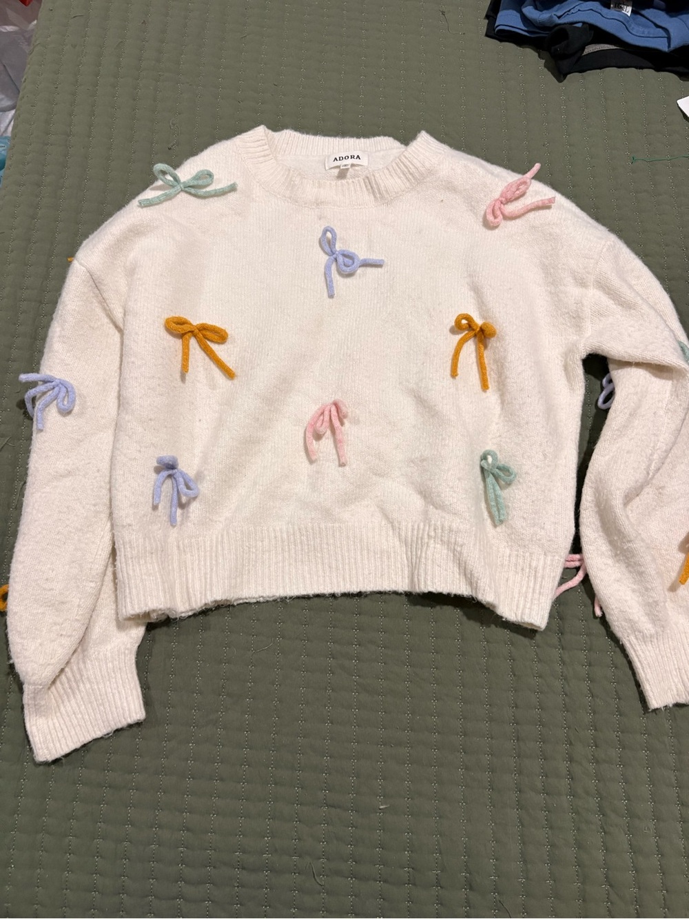 ADORA Cream Crewneck Sweater with Pastel Bow Appliqués